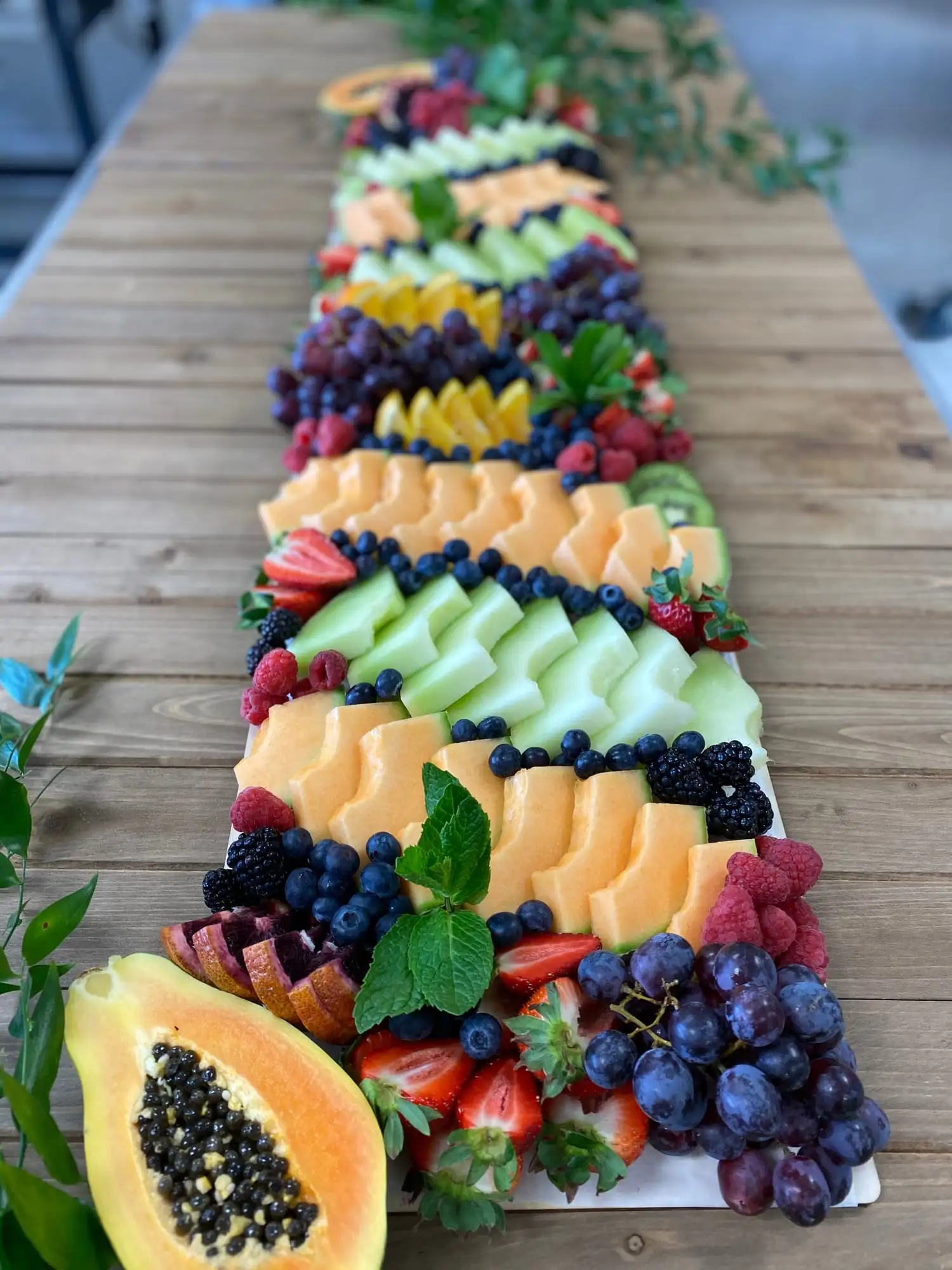 Long display of fresh seasonal fruit for 20 to 25 guests (view 2)