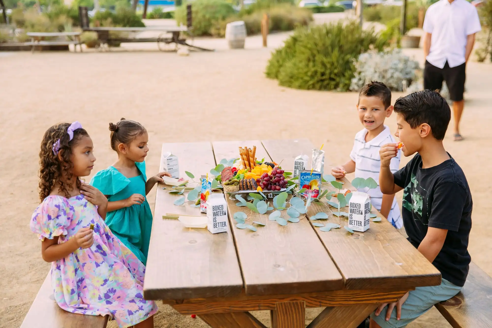 Kids grazing board with cheese sticks, fruit, cookies and crackers (view 4)