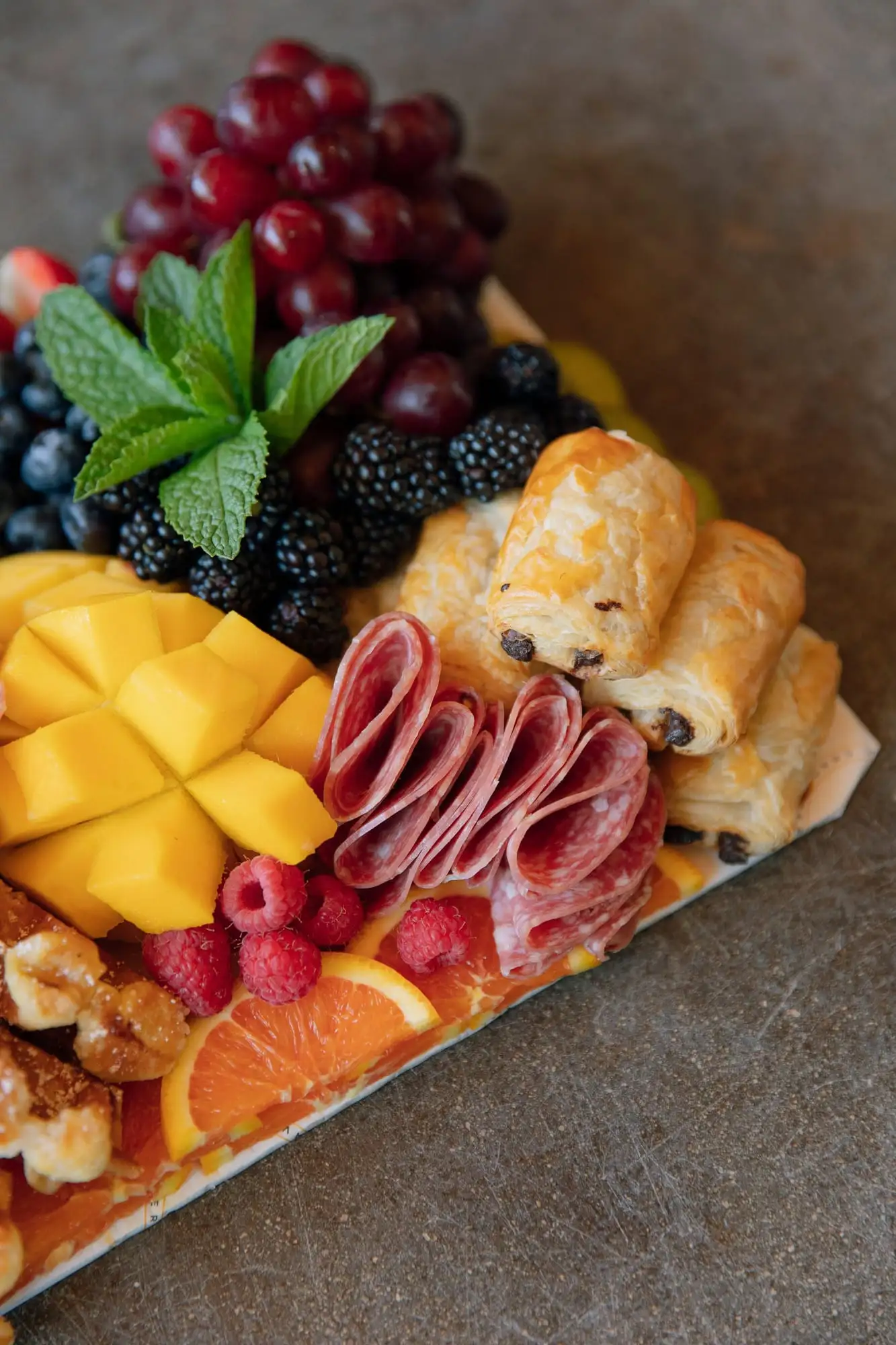 Brunch board with mini croissants, Belgian waffles, fresh fruit and salami (view 5)