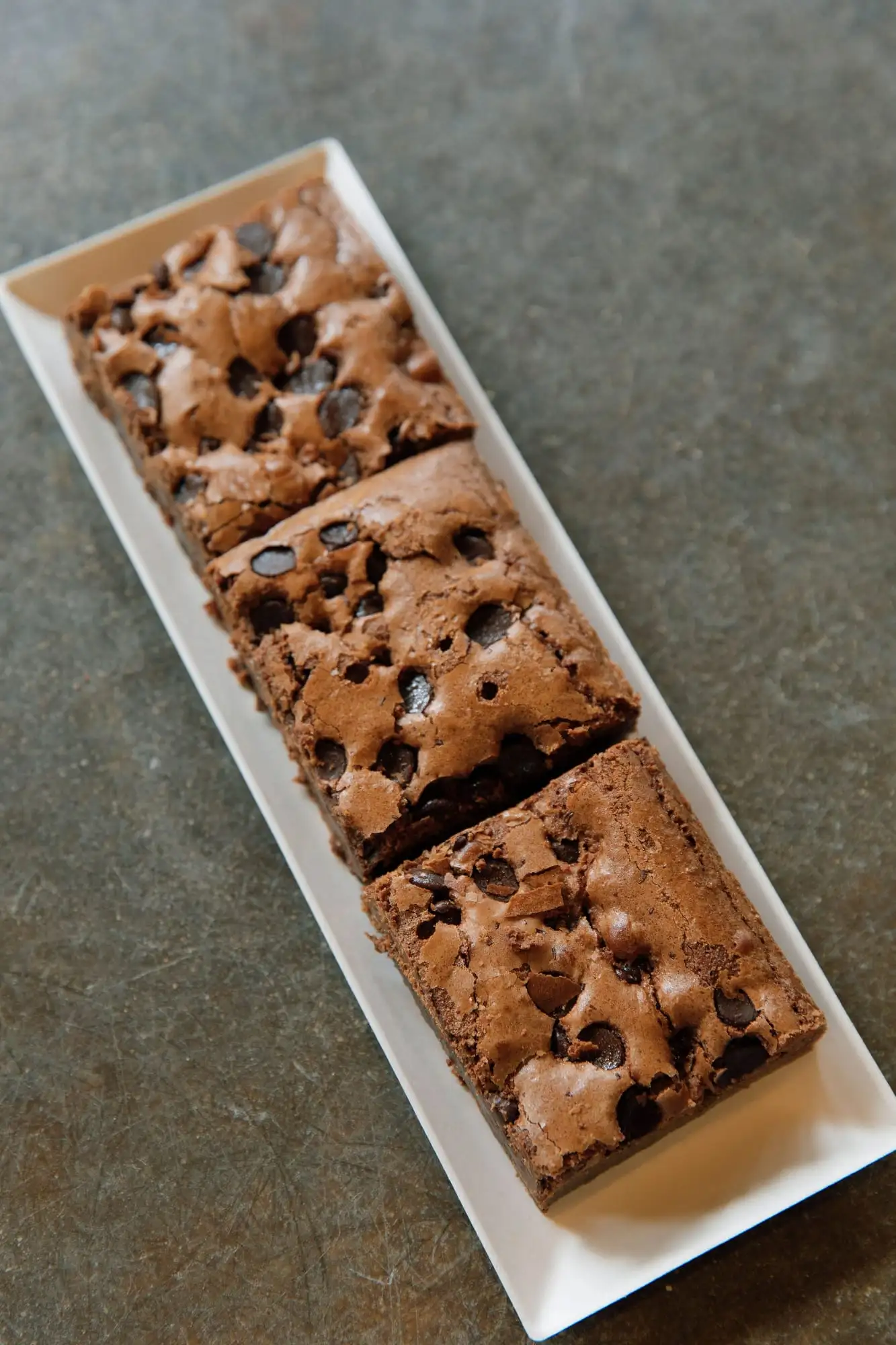 Squares of fudgy chocolate chip brownies