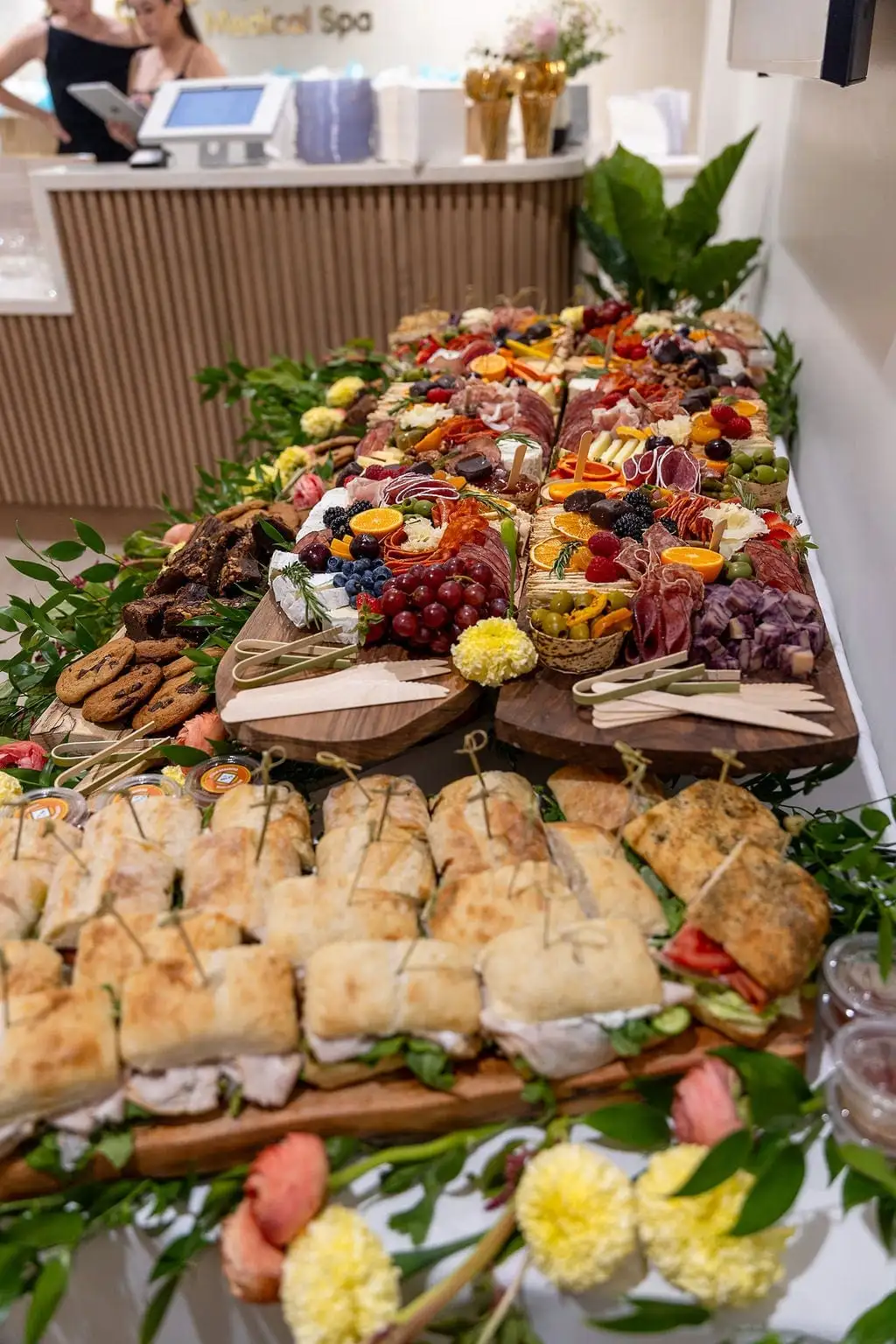 Long charcuterie board with cheeses, cured meats, fruit and chocolates for 30 guests (view 8)