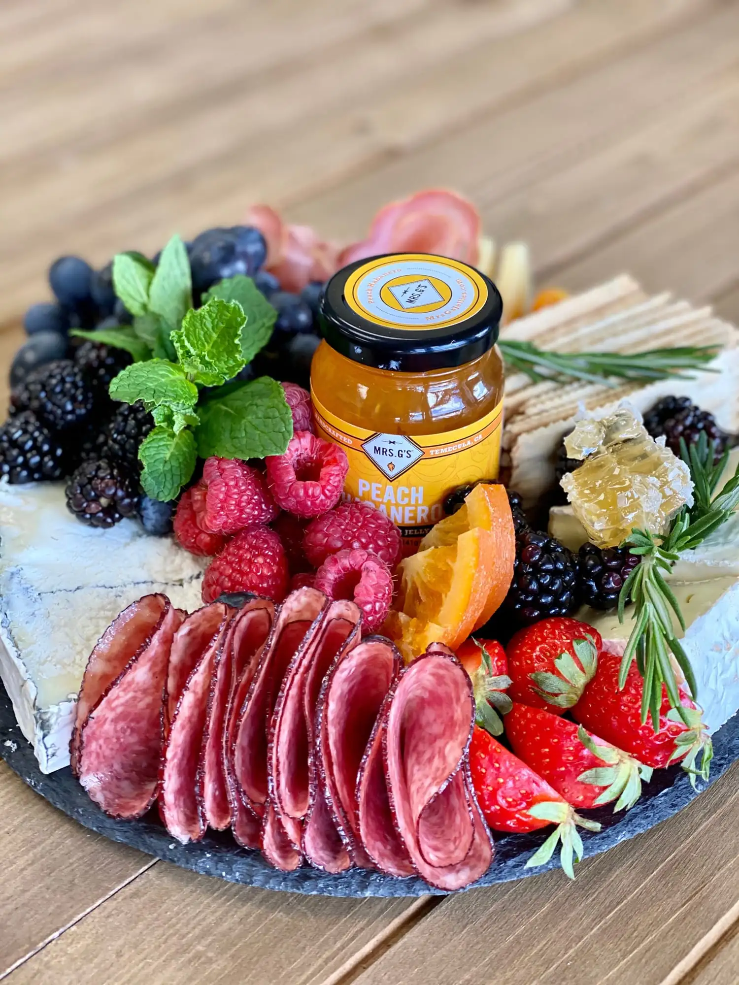 Round board of cheeses, cured meats, fruit and nuts for 4 to 6 people (view 3)