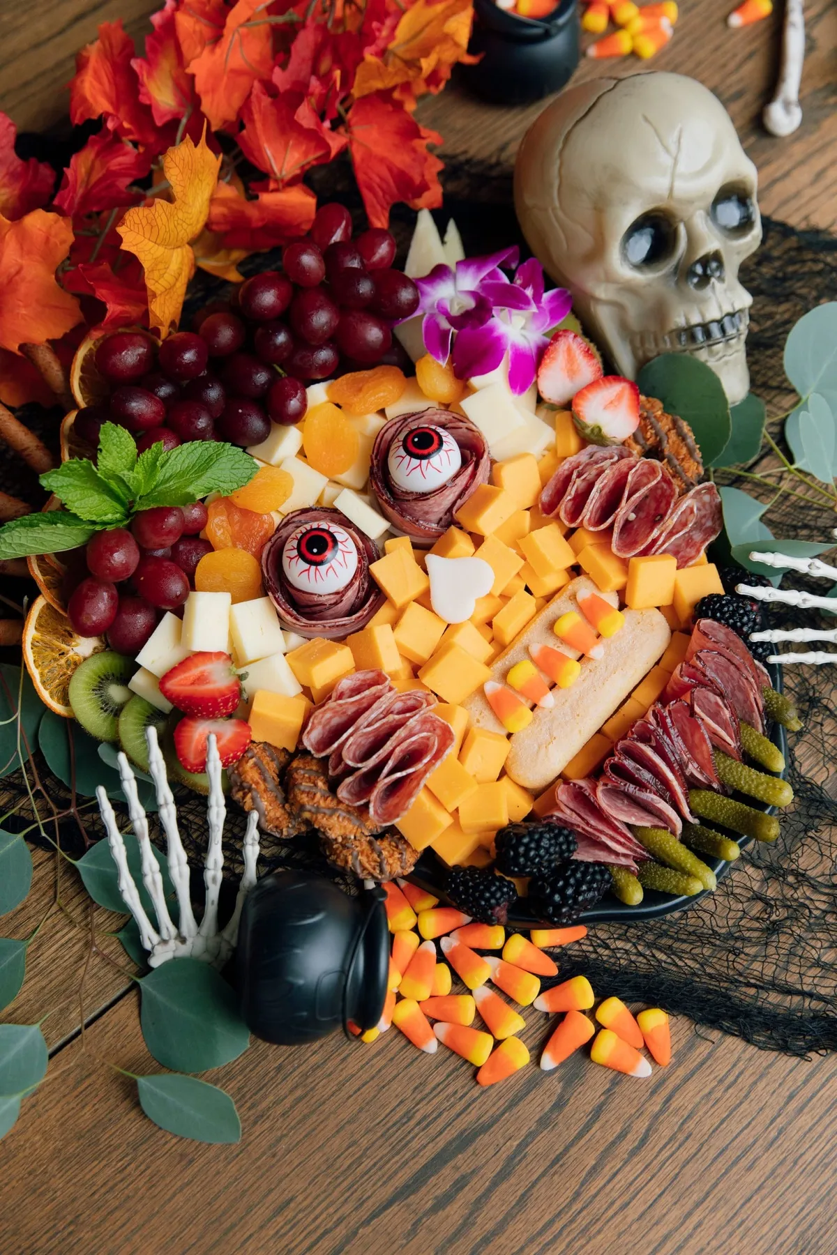 A Halloween charcuterie board shaped like a monster face